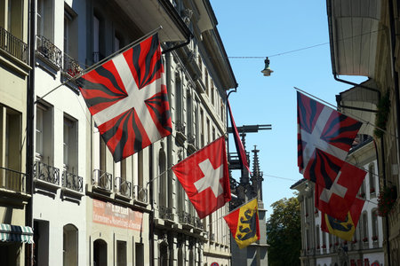 BERN, SWITZERLAND - CIRCA AUGUST 2015 Flags on the street