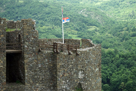 Flag on the tower in Maglic fortress in Serbiaの写真素材
