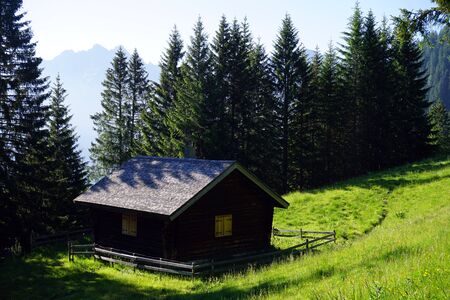 Farm house in mountain valley in Lichtensteinの写真素材