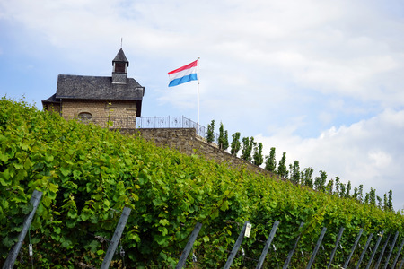 Small chapel with flag in Luxembourgの写真素材