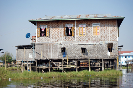 NYAUNGSHWE, MYANMAR - CIRCA APRIL 2017 Wooden house on the Inle lakeのeditorial素材