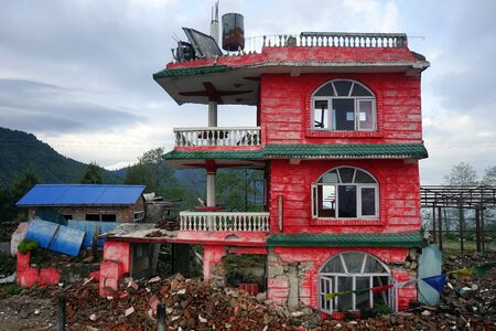 CHISAPANI, NEPAL - CIRCA APRIL 2017 Ruined houses on the main streetのeditorial素材