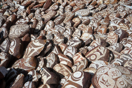 A heap of stones in buddhist monastery in Tibet, Chinaの写真素材