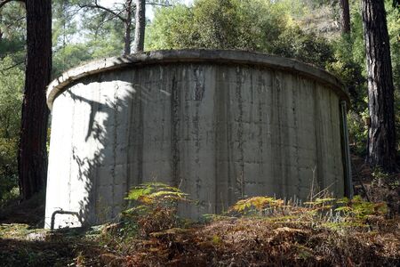 Big concrete cictern in the forestの写真素材