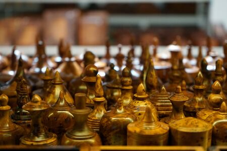 Wooden souvenirs on the shelfの写真素材