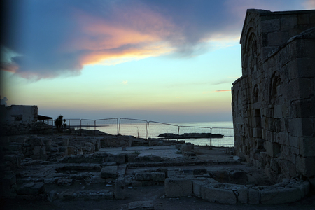 Ruins of Ayios Philion church near Dipkarpas after sunset, North Cyprusの写真素材