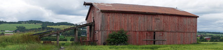 Old barn on the field in Norway