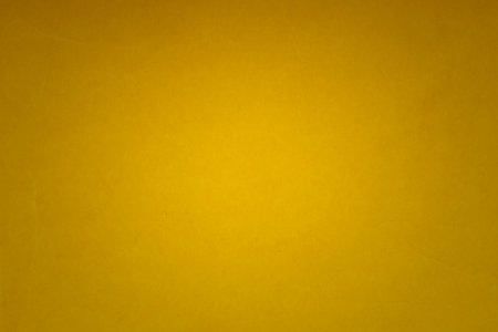 Yellow paper texture or background for design with copy space for text or image.の写真素材