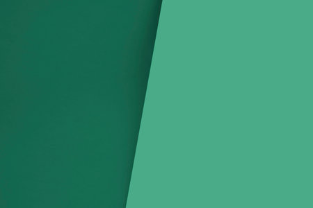 Green paper background. Minimal geometric design with copy space for textの写真素材