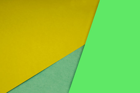 green and yellow paper background with copy space for text or image.の写真素材