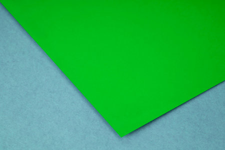 green and blue paper background with copyspace for text or imageの写真素材
