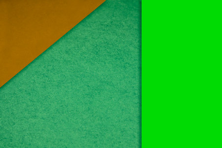 green and orange paper background with copy space for text or image.の写真素材