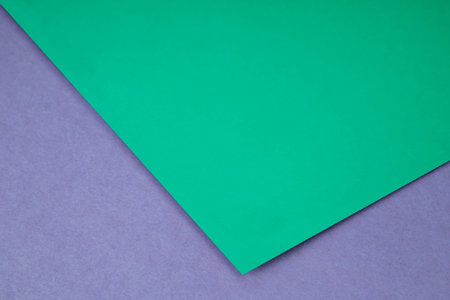 Green and purple paper background with copy space for text or image.の写真素材