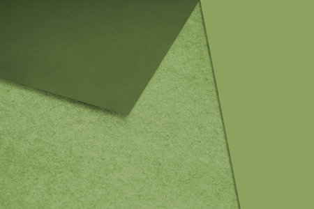 Green paper background with copy space for text or image. Close up.の写真素材