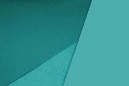 Turquoise and turquoise paper background with copy space.の写真素材