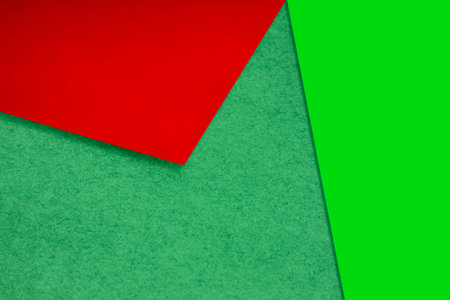 Color papers geometry composition background with red, green and black tones.の写真素材