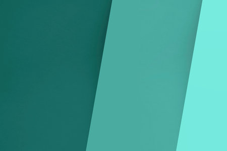 Abstract geometric paper background in green and blue tones. Minimal concept.の写真素材