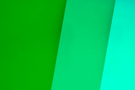 Abstract background of green and blue sheets of paper overlapping each other.の写真素材