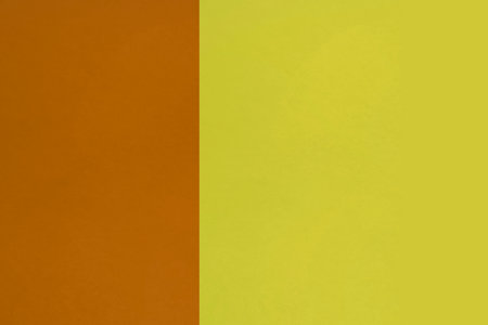 Orange and yellow color paper background with copy space for text or imageの写真素材