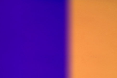 abstract background with blue and orange colors and copy space for textの写真素材