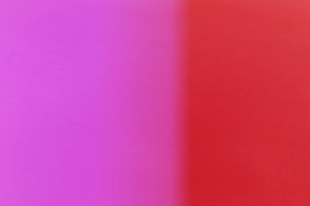 abstract background with pink and red gradient color and blurred background textureの写真素材