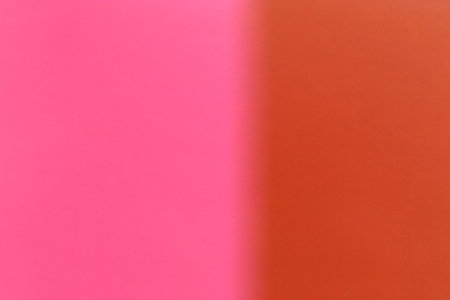 Orange and pink paper texture background with copy space for text or image.の写真素材