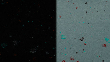 Abstract background. Multi-colored spots of paint on a black background.の写真素材