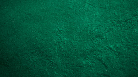 Green concrete wall texture or background for design with copy space for text or imageの写真素材