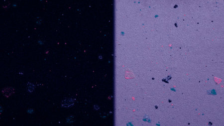 abstract background: multi-colored dots on a dark blue backgroundの写真素材