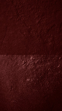 Red grunge wall background or texture. Wallpaper for design.の写真素材