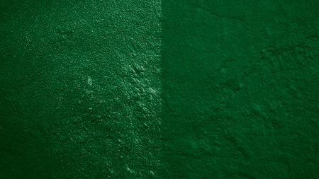 Green grungy wall texture. Abstract background and texture for design.の写真素材