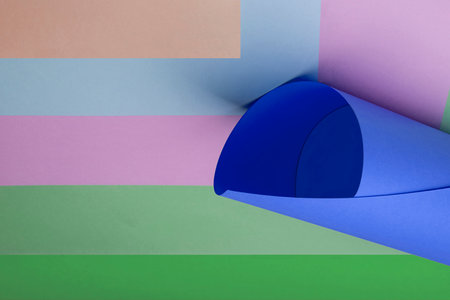 geometric shapes on blue and green paper. geometric background. minimal geometric shapes composition.の写真素材