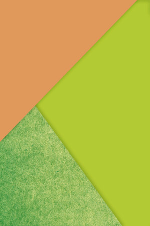 green and orange paper background with copy space for text or image.の写真素材