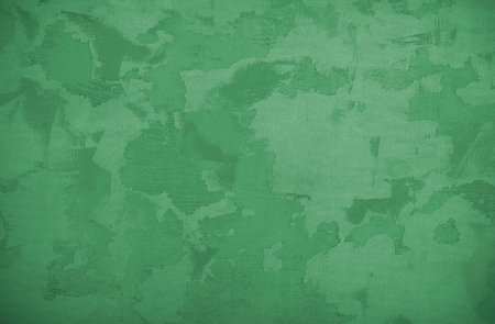 Green camouflage fabric texture or background for design with copy space for text or image.