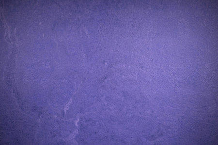 Grunge blue cement wall texture background with vignette.