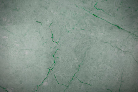Green marble texture with cracks. Abstract background and texture for design.の写真素材