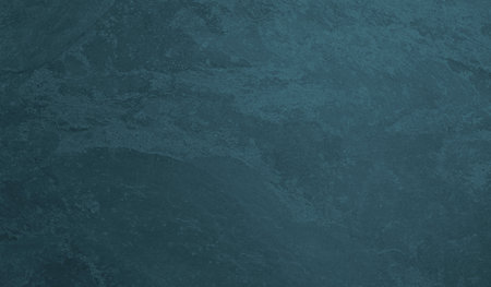 Close-up of textured blue background with vignette.