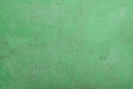 Green grunge wall background or texture. Vintage grunge background texture