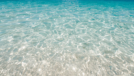 Beautiful sea water surface with sunlight reflection. Summer and vacation backgroundの素材
