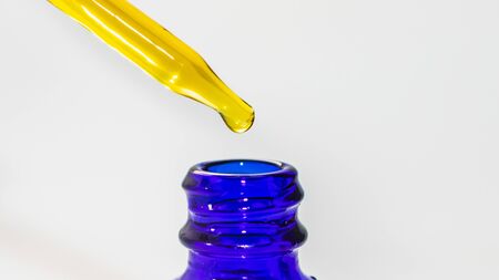CBD Oil Dropper Isolated On Whiteの写真素材
