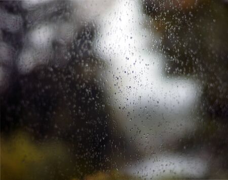Water Drops On scenic windowの写真素材