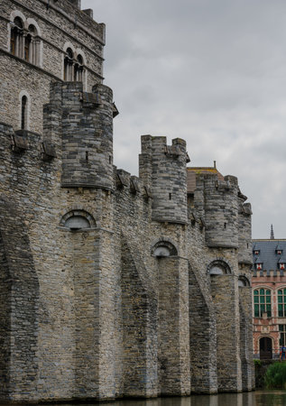 Belgium, Ghent city, old town, historical houses at River Leie at duskの写真素材
