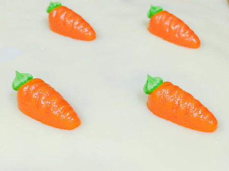 sweet carrot cake with delicious cream on white backgroundの写真素材