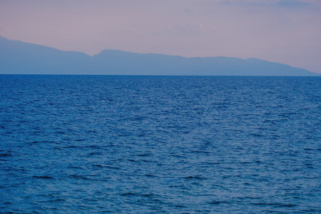 Beautiful landscape with sea waves and sunsetの写真素材