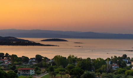 Mediterranean Sunset in Greece with mountains