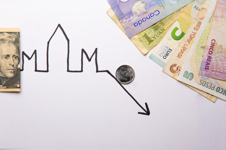 Ruble dollar euro argentinian peso brazil reai chinese yuan turkish liras with hand drawn grphic picture of falling trend line, ruble rolling downの写真素材