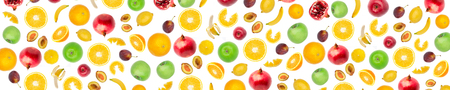 Wide panoramic collage fresh fruit isolated on white background. Bananas, citrus fruits, apples, plums, pomegranate, lemons. Skinali foodの写真素材