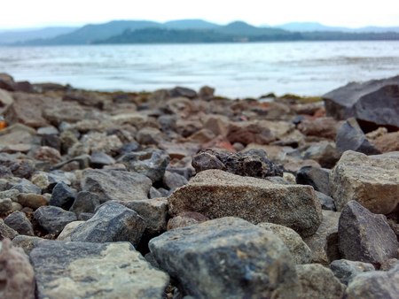 Bunch of rocks lying around riverの写真素材
