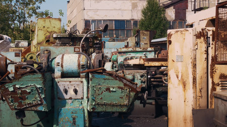 Abandoned remains of machine tools for the production of spare parts rust in the open air and become...