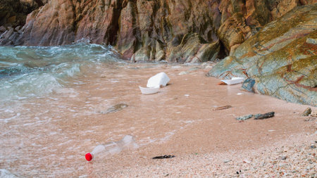 Large amount of plastic trash littering ocean shore. Concept Ocean Rubbish Pollution Environmental...